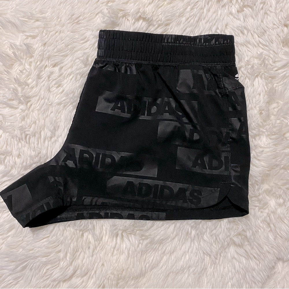 Adidas running shorts.